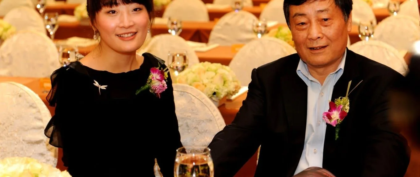Kelly Zong with her father Zong Qinghou, founder of Wahaha Group, at a formal event