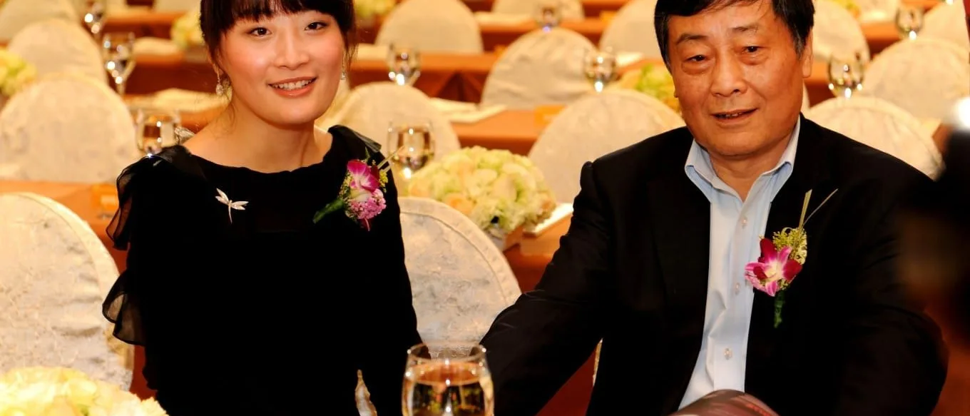 Kelly Zong with her father Zong Qinghou, founder of Wahaha Group, at a formal event