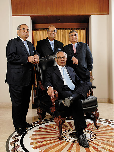 The Hinduja brothers at a family business gathering before the feud fractured their public image of unity